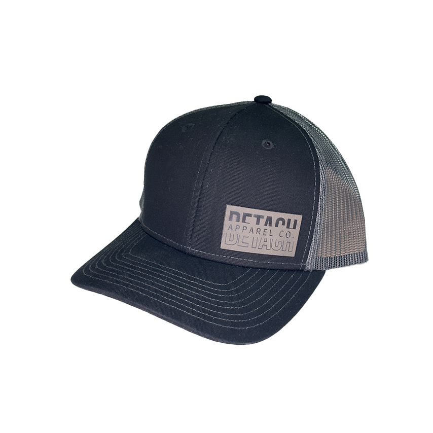 Black and gray mesh snap back hat with leather Detach Apparel logo